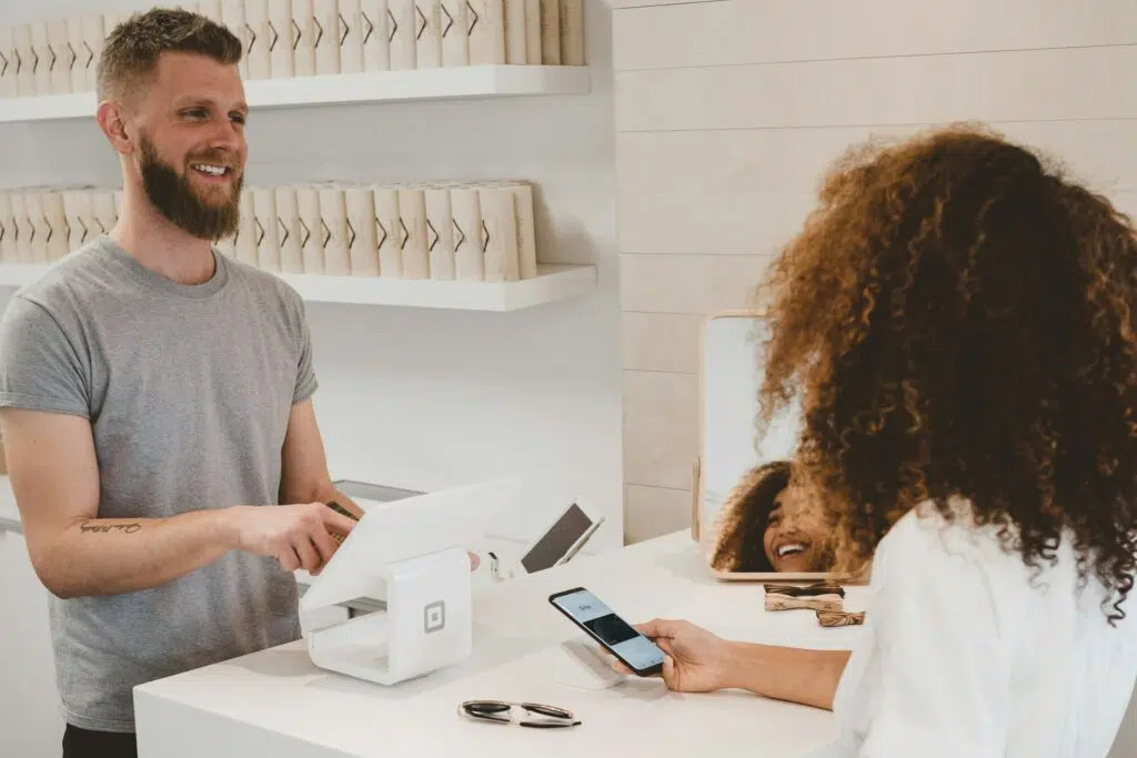 A salesperson interacting with a customer.